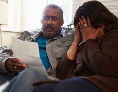Stressful Couple checking Bills